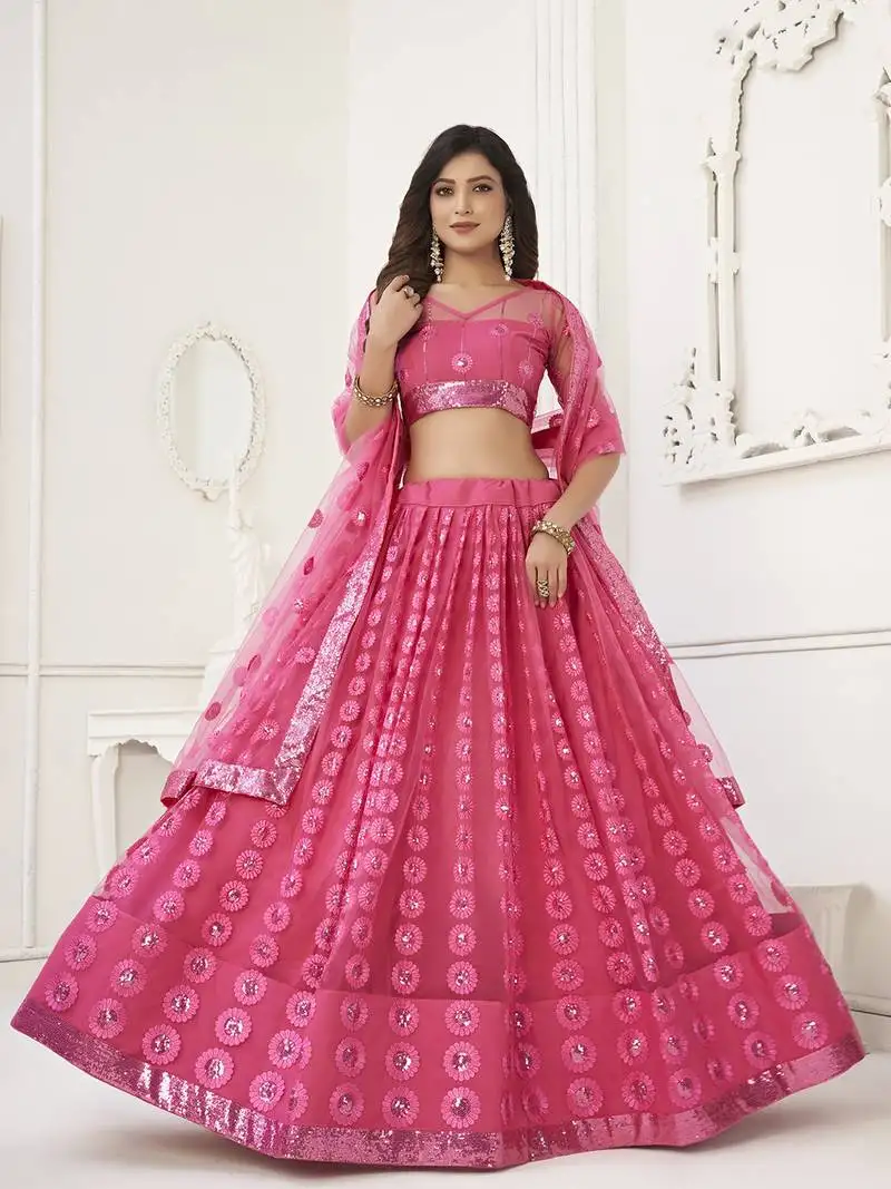 Astonishing pink sequins net reception wear wear lehenga choli