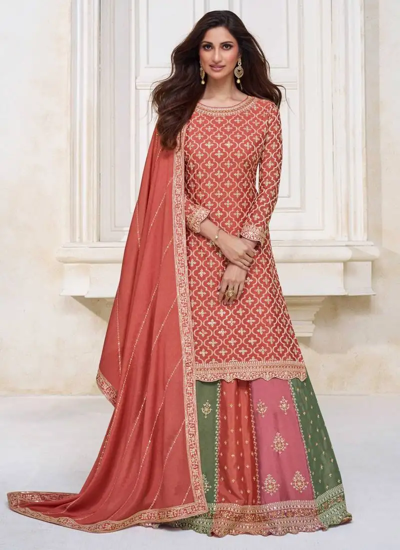Chinnon embroidered coral punjabi salwar suit up to 42" size stitched