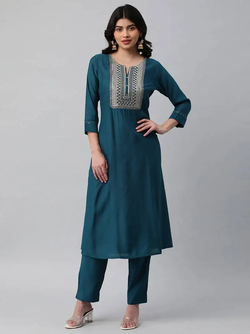 A line kurta in silk blend fabric with zari and sequin detailling.