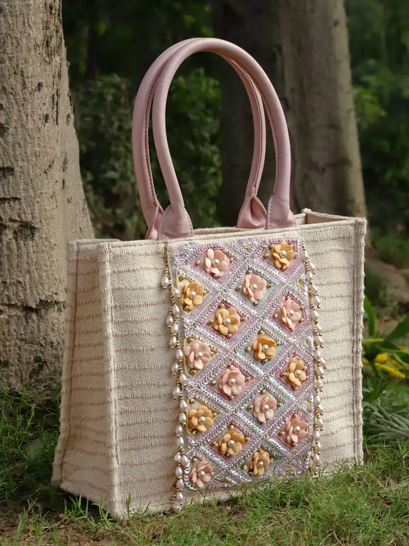 Kooky natural & multi floral embellished handloom cotton canvas handheld bag