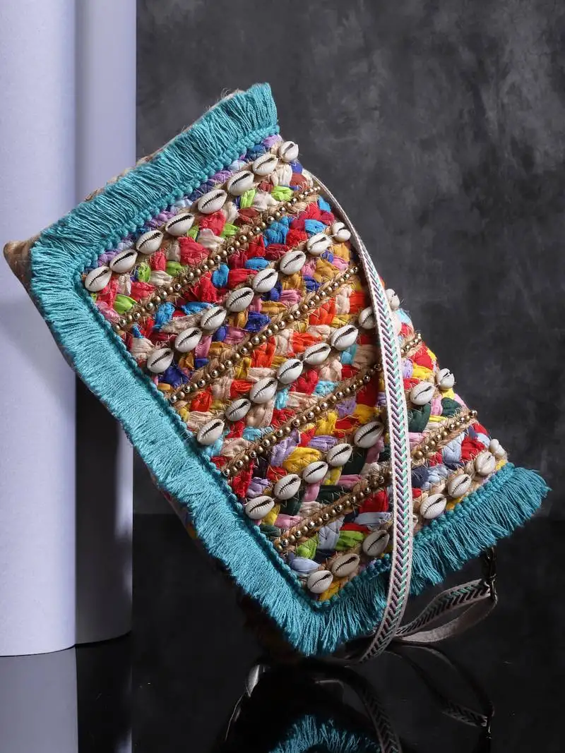 Sisal baked beige, turquoise blue & multi striped & embellished jute sling bag